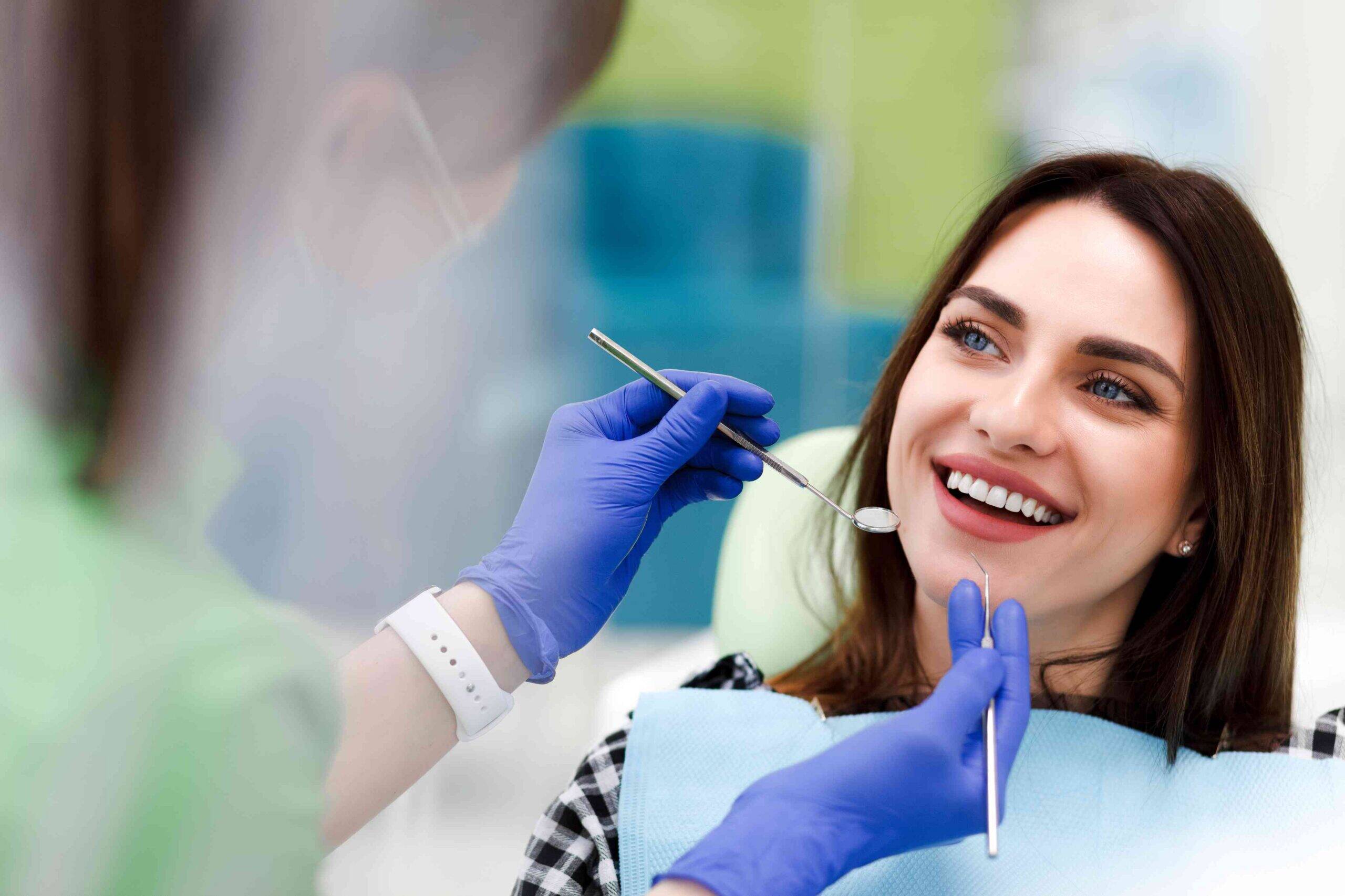 Smiling patient during a dental examination.